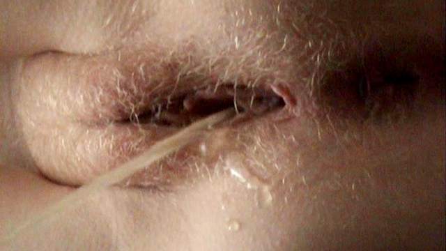 Sweet pissing babe is wiping her shaved pussy
