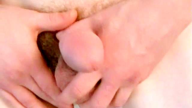 Gay is making a handjob in a solo video