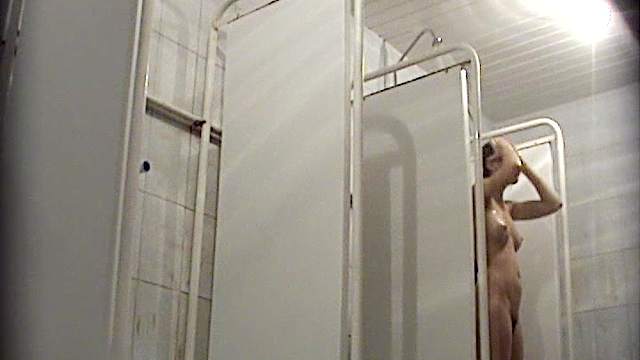 Spicy wet babe is taking shower in the voyeur vid