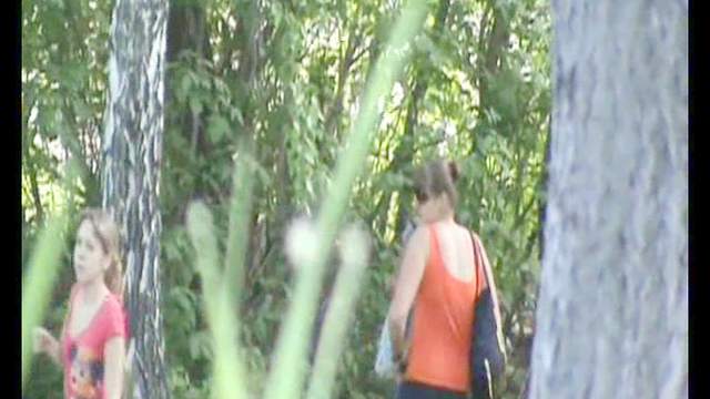 Hot babe is pissing outdoors in the forest