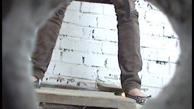 Babe is pissing in the nasty voyeur video