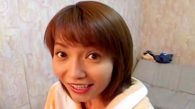 Asian babe Miri Sugihara gives a blowjob