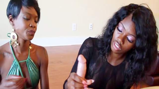 Pretty ebonies are giving blowjob together