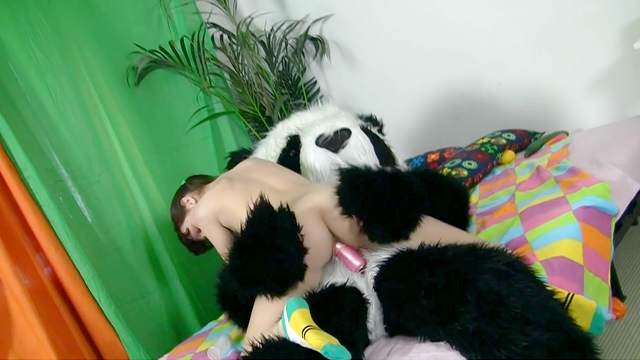 Dark-haired babe gets fucked by panda