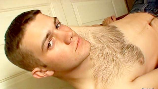 Sexy gay with cute face is masturbating his dick