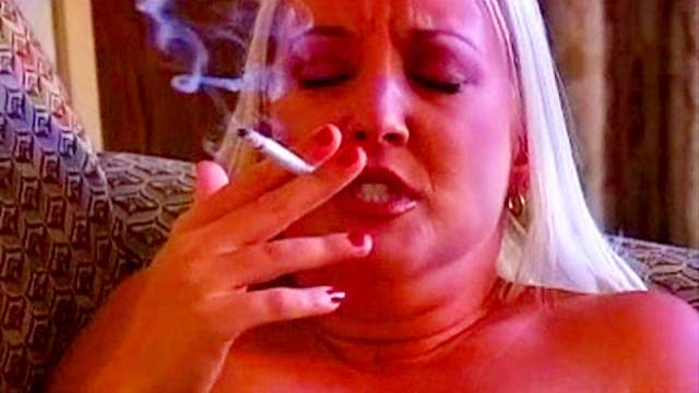 Alluring mature pokes her vagina with cigarette