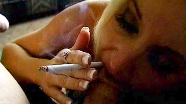 Blonde is smoking and sucking a dick