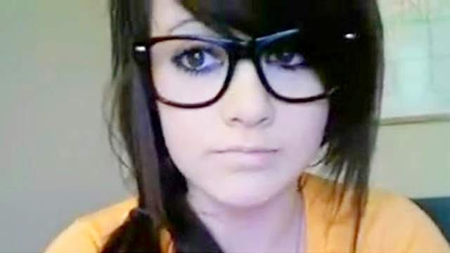 Pretty teen wearing glasses masturbates on webcam recording