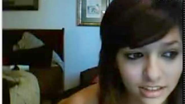 Cute girlfriend is posing on the webcam