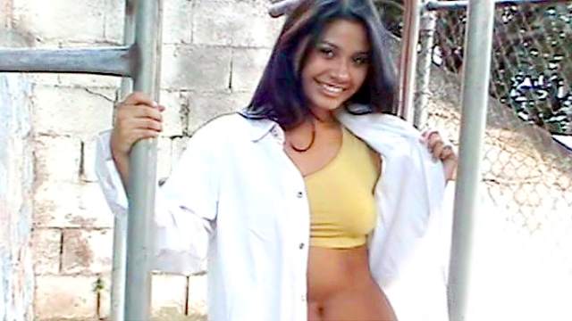 Sexy Latina performs non-nude erotic scene outdoors