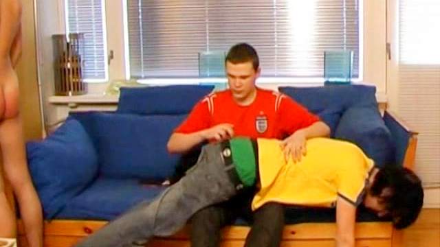 Two gays get spanked on the sofa and have hardcore sex