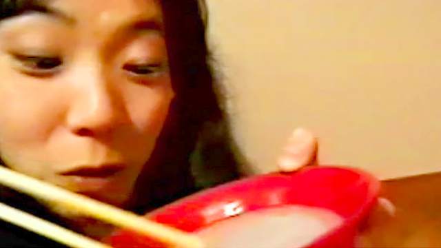 Cute Japanese receives a bukkake and eats cum