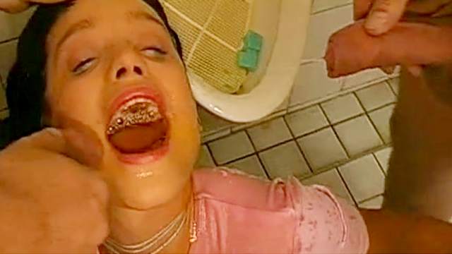 Betty swallows giant load of piss