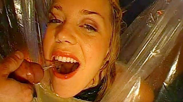 Blonde tramp sucks cock while lying on a cradle