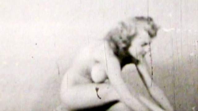 Big-tit model poses topless so cute