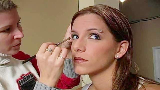 Backstage footage of young girl Pamela doing makeup