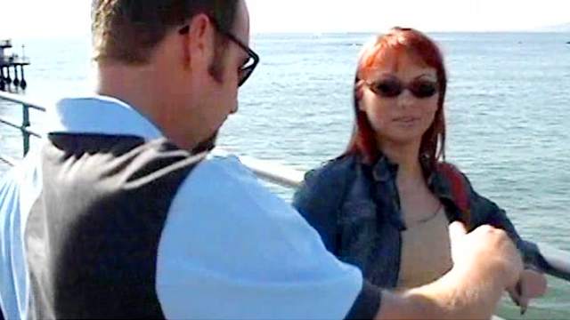 Innocent redhead babe is sucking on the boat