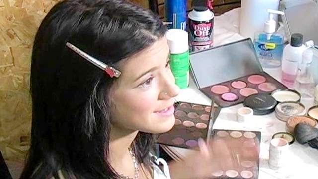 Young girl Francesca is getting makeup on the cam