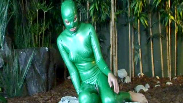 Babe Camila poses in hot green latex