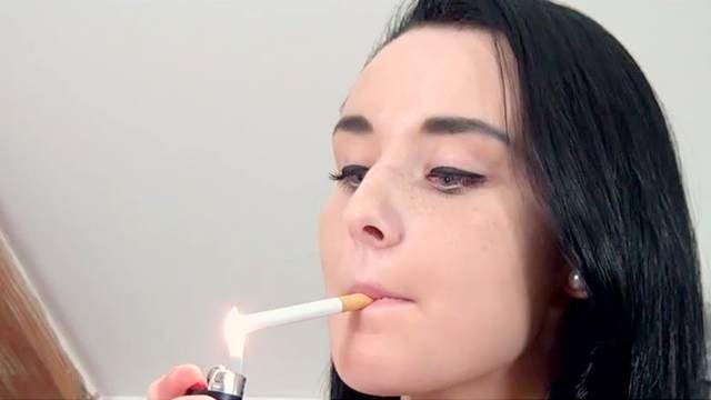Brunette Laura is smoking a cigarette and fucking