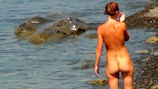 Sweet nudists are posing naked in the water
