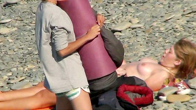 Sweet skinny babe is walking on the beach