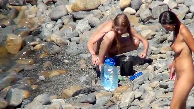 Outdoor voyeur scene at the nudist beach