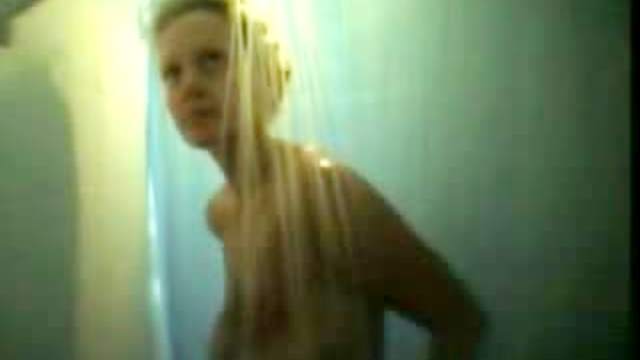 Pretty girl takes a shower