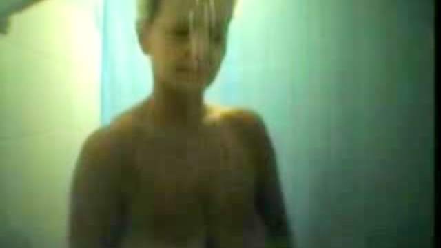 Pretty girl takes a shower