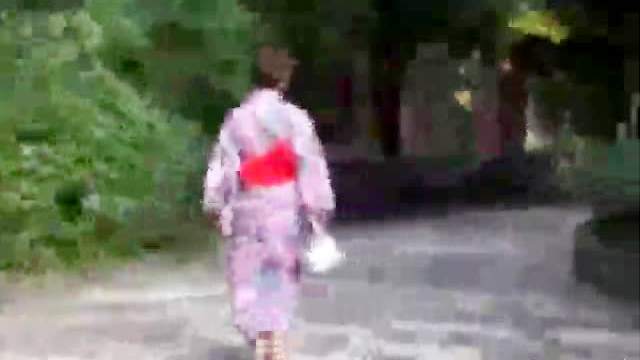 Japanese girls in kimonos outdoors