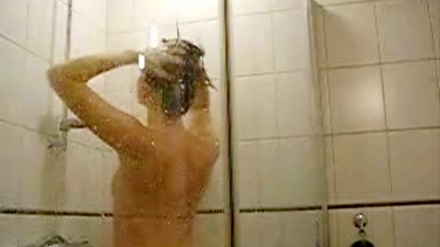 Lovely girl wet in the shower