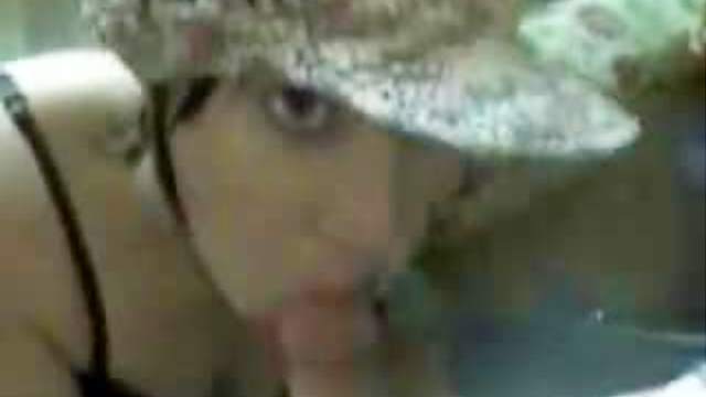 Chick in cute hat sucks dick