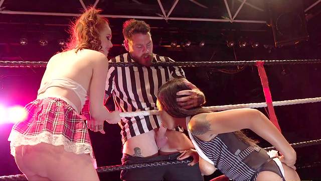 Bitches are enjoying the referee for their kinky threesome in the ring