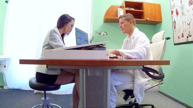 Hot brunette gets nailed by doctor in the office.