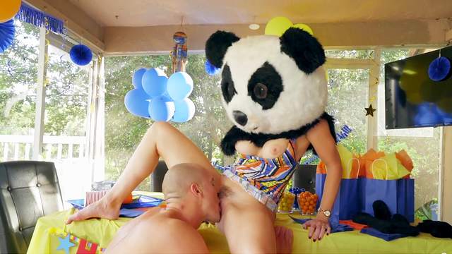 Hot MILF Cory Chase gets some action from a guy in a panda suit