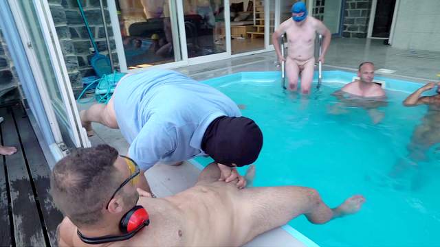 Aroused gay men share the pool for their sexual games