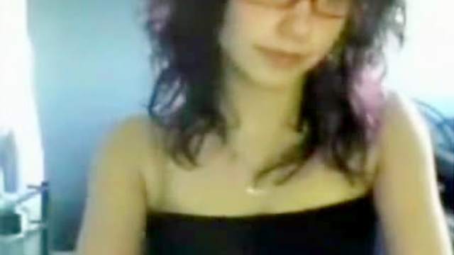 Nerdy webcam girl shows her tits