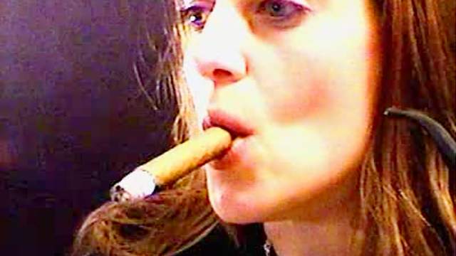 Chick smokes a pipe and cigar
