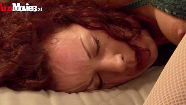 Curly red hair on a sexy masturbator