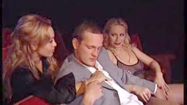 Theater threesome with cumshot