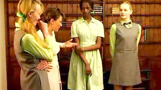 Demure schoolgirls spanked by mistress