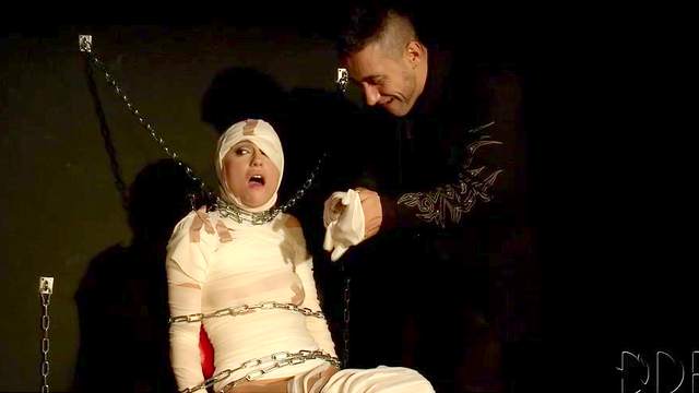 Mummified girl in his dungeon