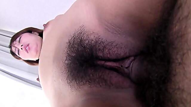 Japanese wife filmed working cock down her hairy muff like a pro