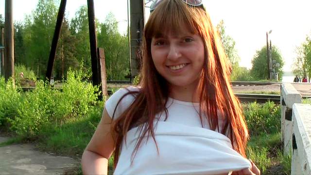 Teen redhead flashes titties in public