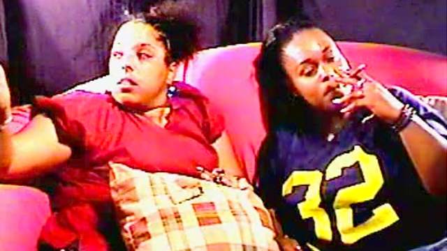 Chubby black chicks smoke on the couch