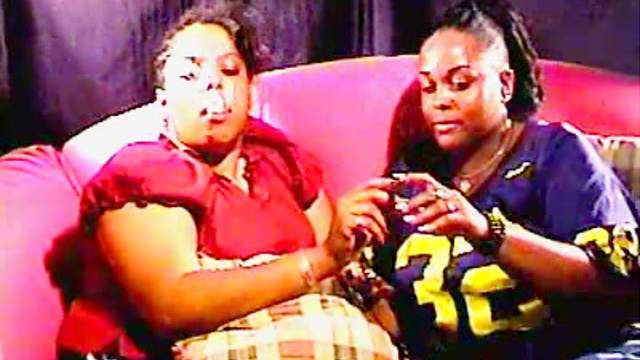 Chubby black chicks smoke on the couch