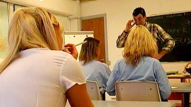Teacher spanks schoolgirls in his class