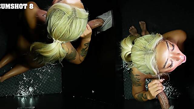 Blonde Gia Dibella sucks a big cock through a gloryhole
