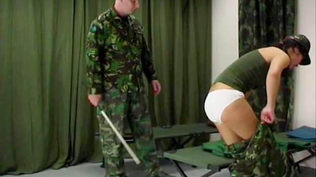 Military girl punished with a caning