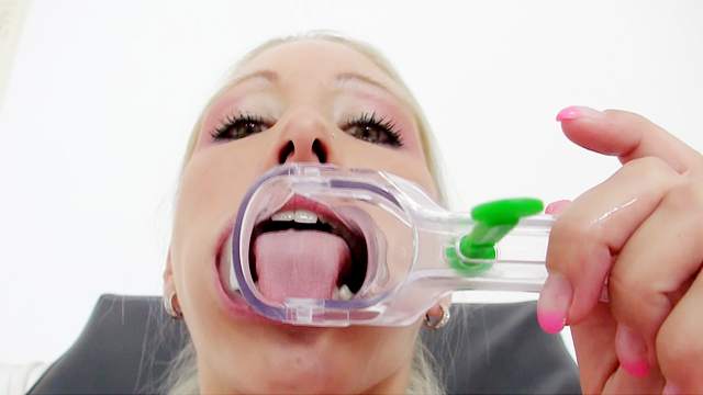 Fresh young nurse with speculum in cunt